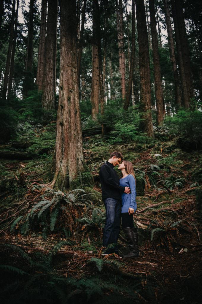 engaged couples embraces in Vancouver forest testimonials